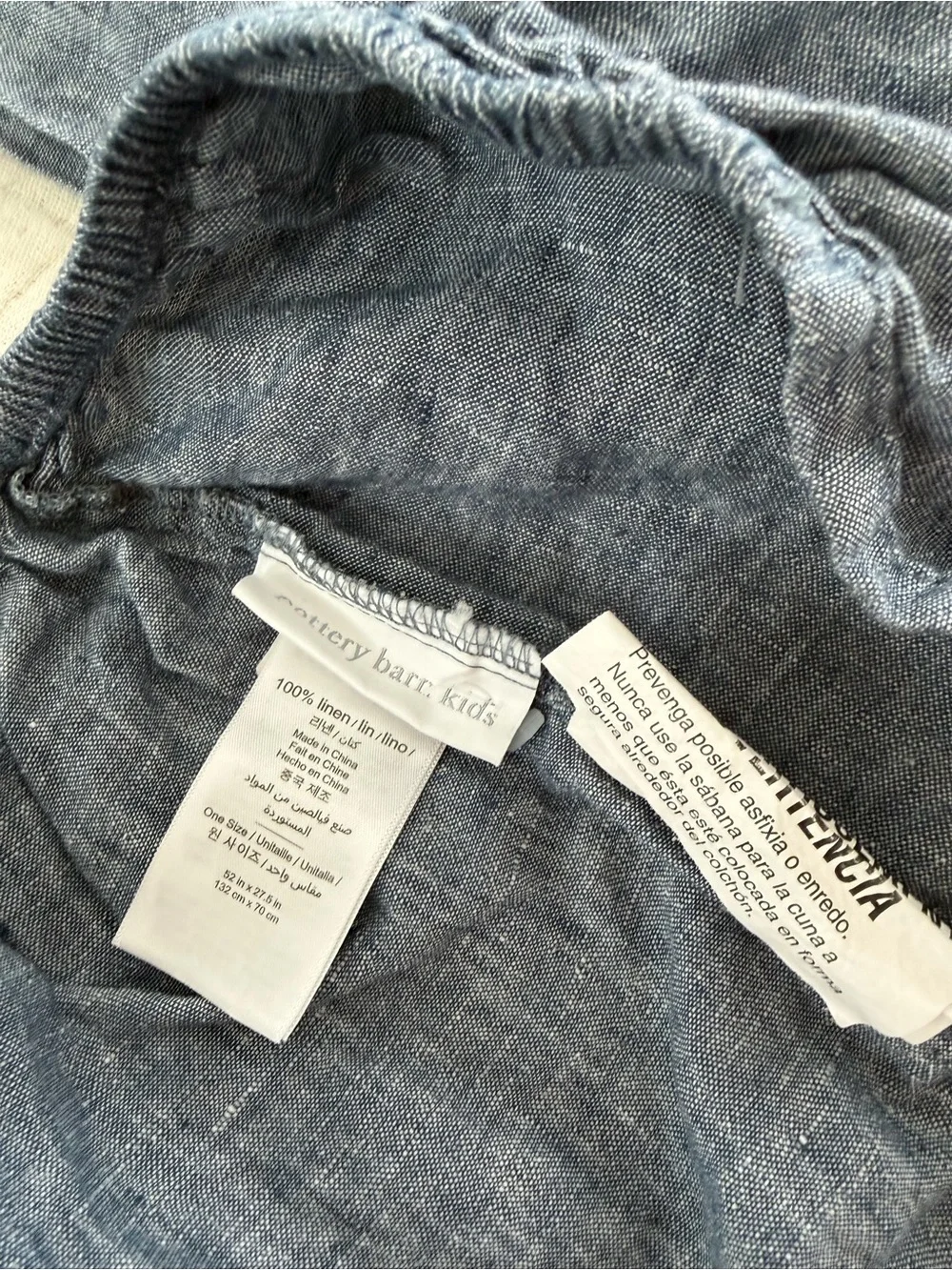 Pottery Barn Kids European linen quilt and fitted crib sheet set